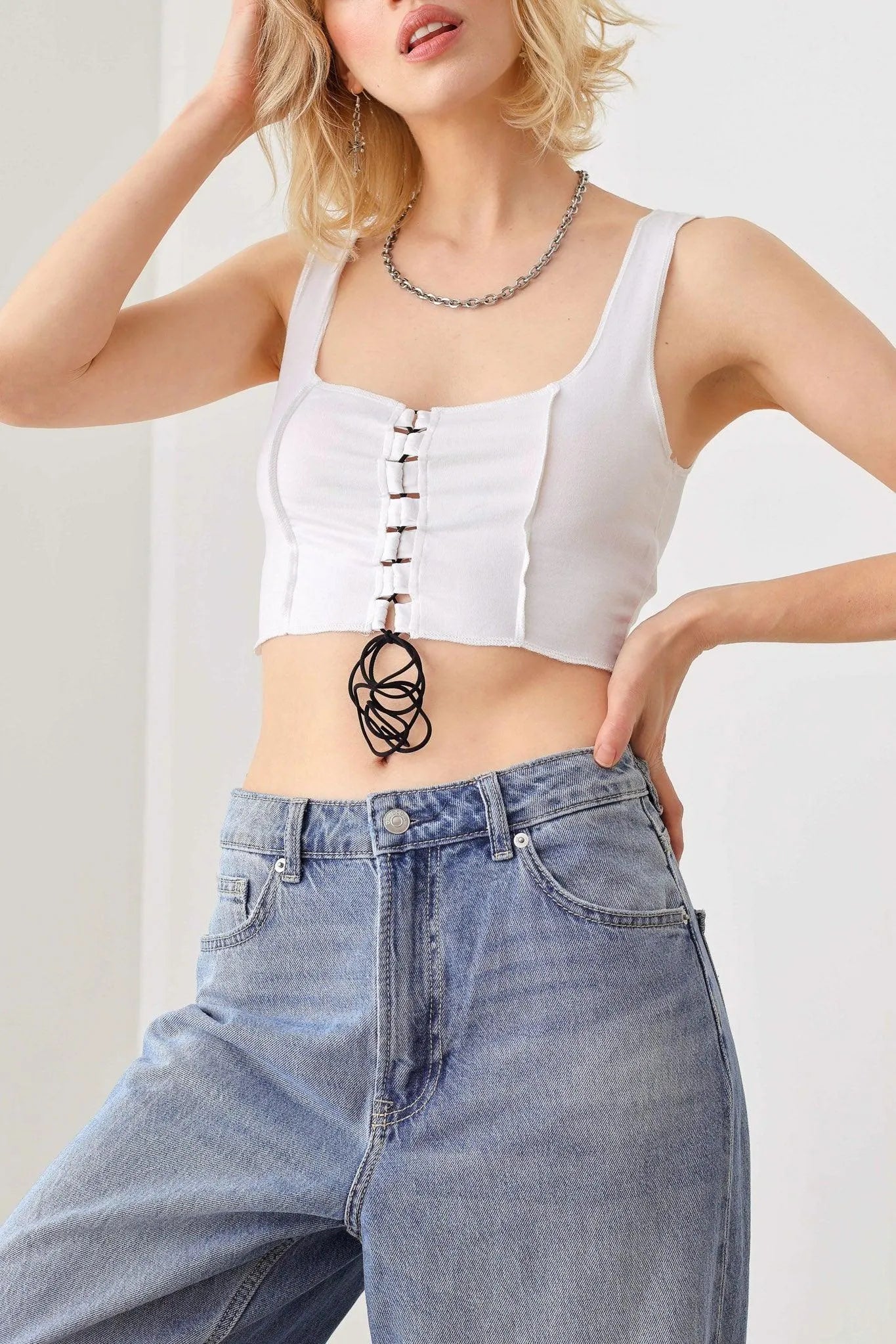 Solid Lace-Up Sleeveless Round Neck Crop Top